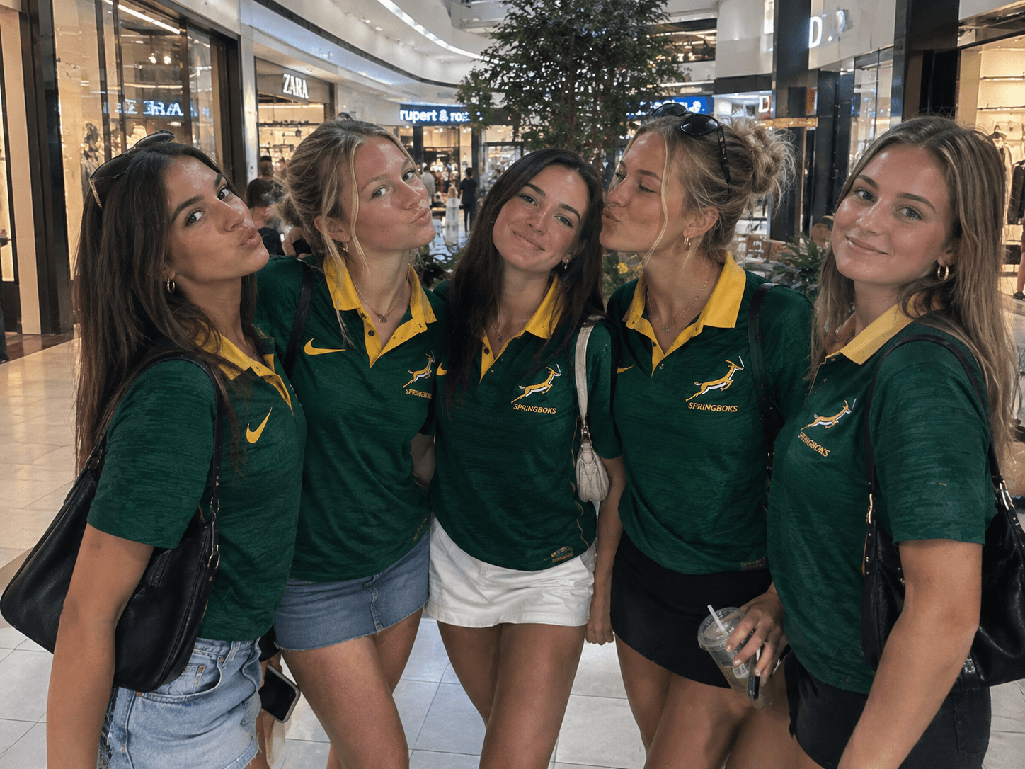 Group of friends in Springbok polos at the mall